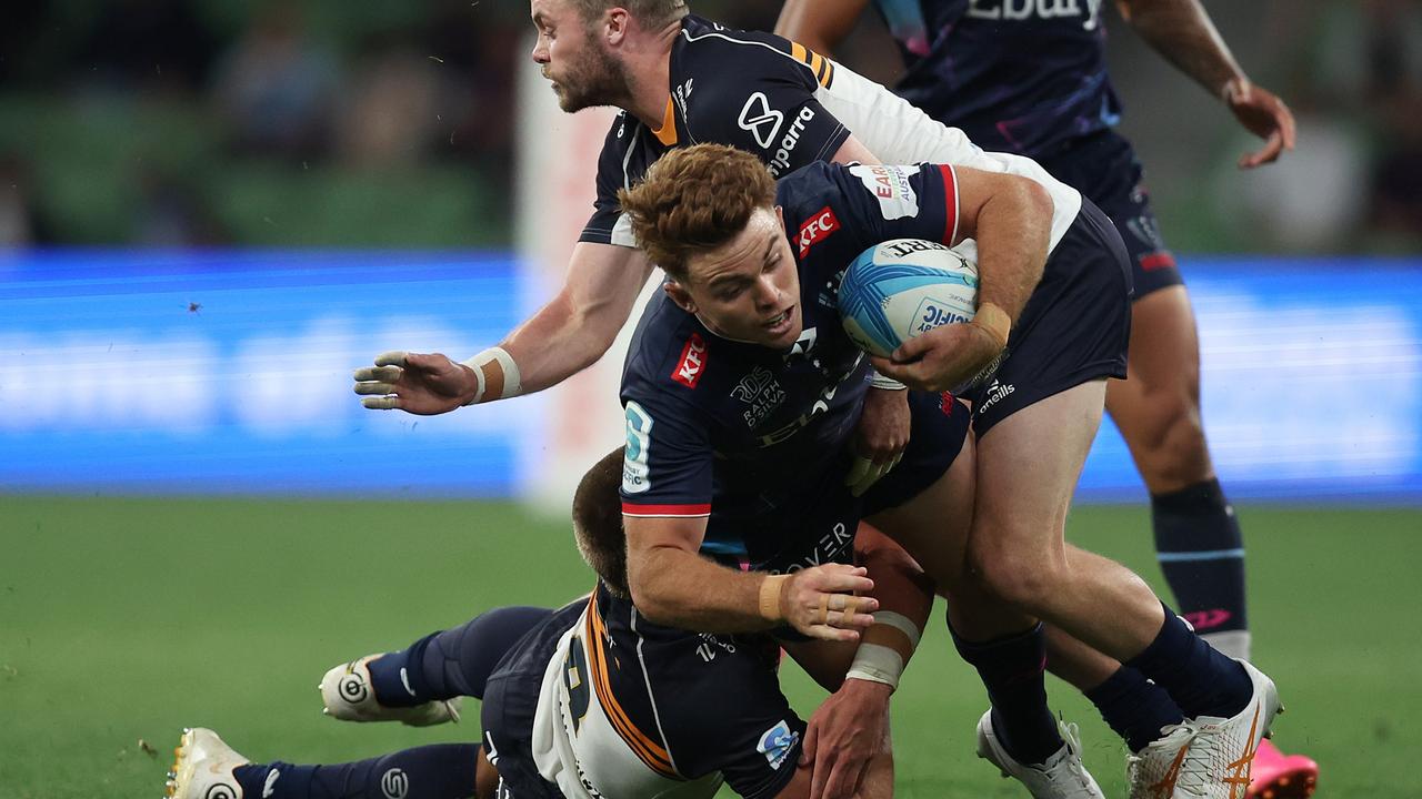 Andrew Kellaway of the Rebels is tackled (Photo by Daniel Pockett/Getty Images)