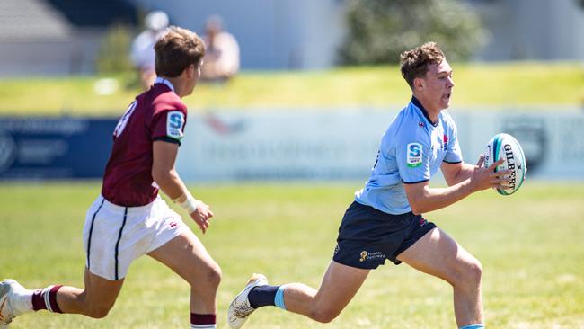 Rex Bassingthwaighte on the run against the Reds this season. Picture: Julian Andrews