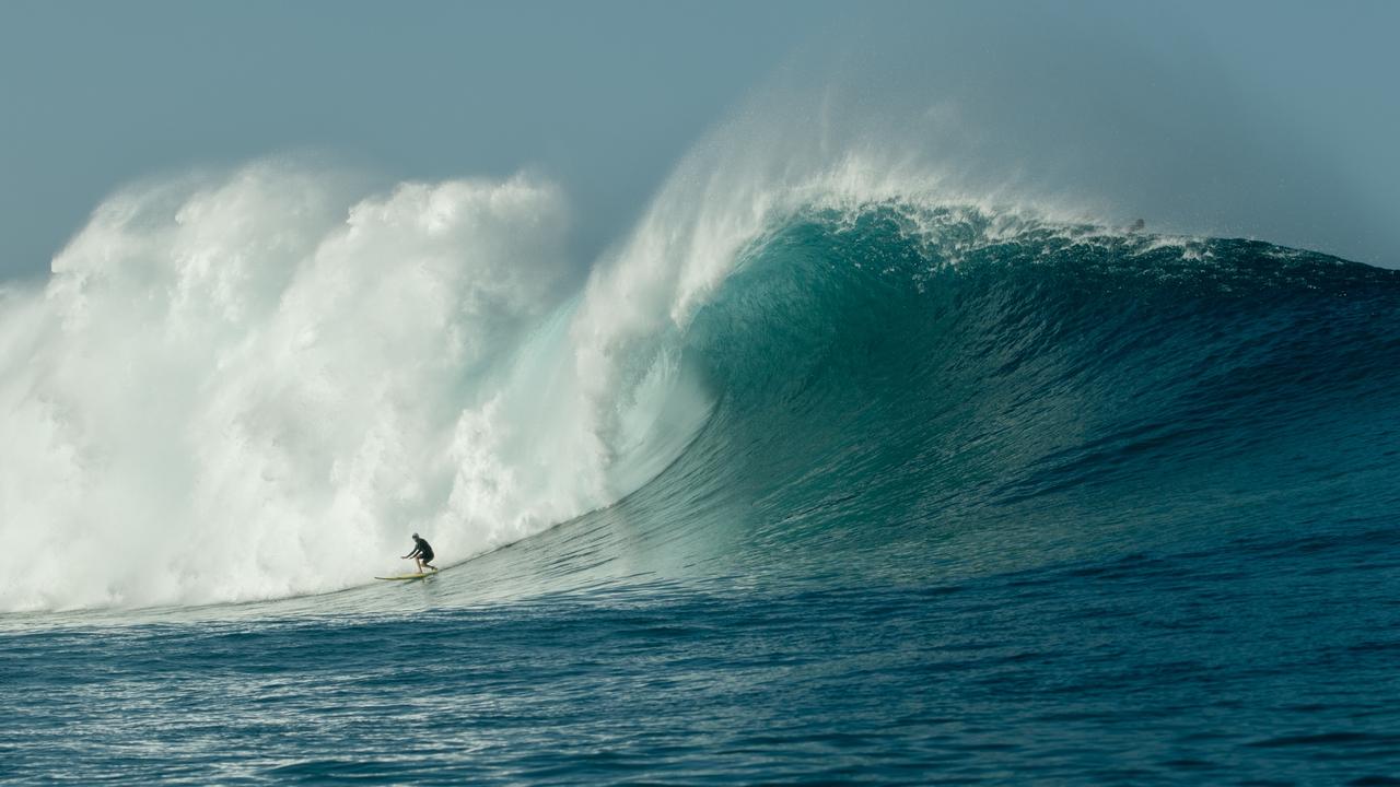 Laura Enever on the wave just before it swallowed her and she was sent tumbling under the water.