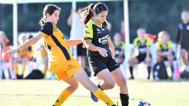 SOCCER: Junior football carnival, Maroochydore. Sunshine Coast Wanderers V Logan Lighting Maroon, junior girls. Picture: Patrick Woods.