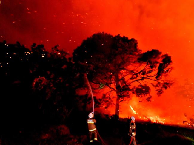 A monstrous and devastating fire ripped through Peregian Springs, Peregian Breeze and Peregian Beach heading north towards Marcus Beach and Noosa. Photo: John McCutcheon