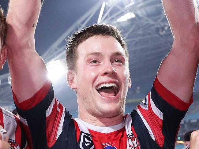 SYDNEY, AUSTRALIA - OCTOBER 06: (L-R) Mitchell Aubusson, Luke Keary and Nat Butcher of the Roosters celebrate victory after the 2019 NRL Grand Final match between the Canberra Raiders and the Sydney Roosters at ANZ Stadium on October 06, 2019 in Sydney, Australia. (Photo by Matt King/Getty Images)