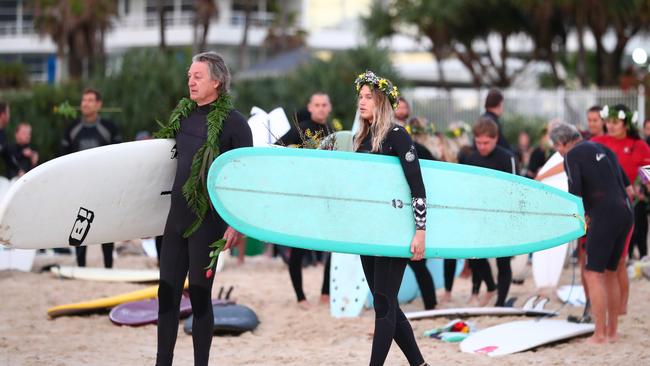 GOLD COAST, AUSTRALIA - JULY 11: Alex Pullin's father and girlfriend Ellidy Vlug head out to sea to pay respects in memory of Alex 'Chumpy' Pullin on July 11, 2020 in Gold Coast, Australia. Australian Winter Olympic Games Snowboarder Alex 'Chumpy' Pullin died on Wednesday 8 July in a drowning accident while spearfishing at Palm Beach on the Gold Coast, aged 32. (Photo by Chris Hyde/Getty Images)
