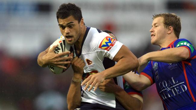 Karmichael Hunt in action for the Broncos.