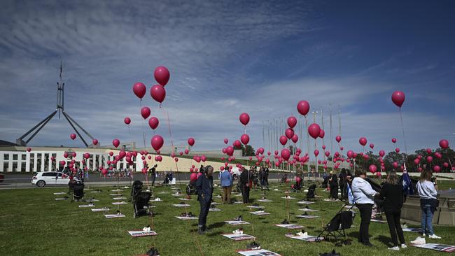 Organisers laid out posters of the 239 Israelis and foreigners taken hostage by Hamas on October 7. Picture: NCA NewsWire / Martin Ollman