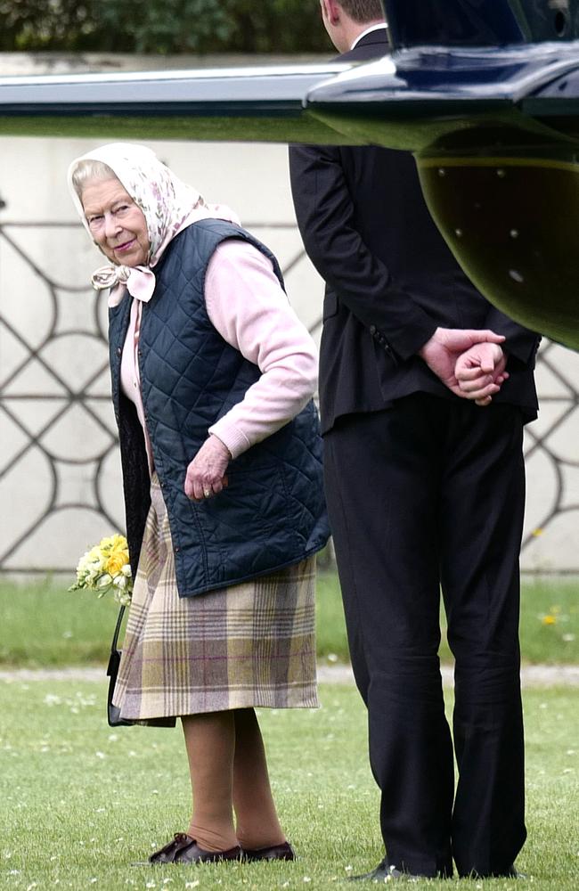 The Queen arrives at Kensington Palace by helicopter to meet Prince Louis for the first time as she brings a hand-picked bouquet of flowers as a gift for the Duchess of Cambridge. Picture: MEGA