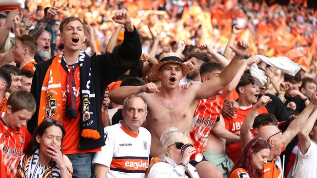 Luton Town supporters celebrate victory. (Photo by Alex Pantling/Getty Images)