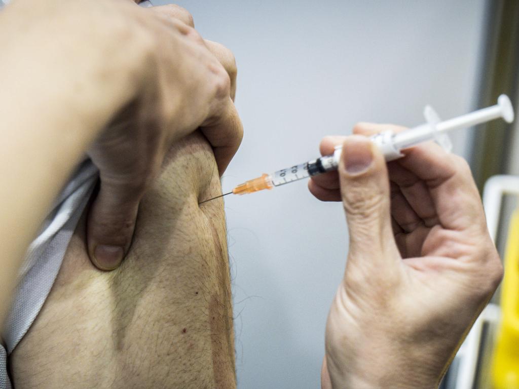 People are urged to get vaccinated as cases surge. Picture: Tony McDonough/NCA NewsWire