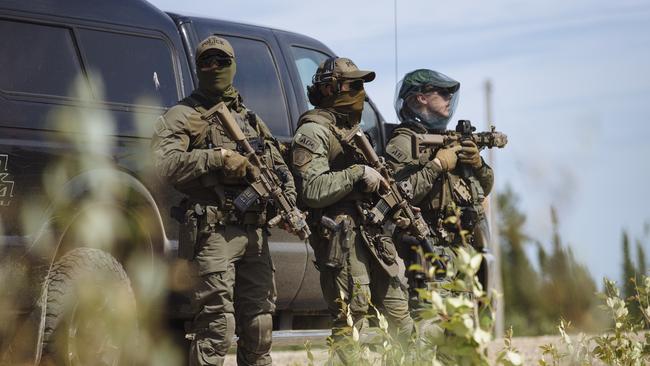 Members of the Royal Canadian Mounted Police Emergency Response Team during the manhunt. Picture: Angus Mordant for NewsCorp Australia