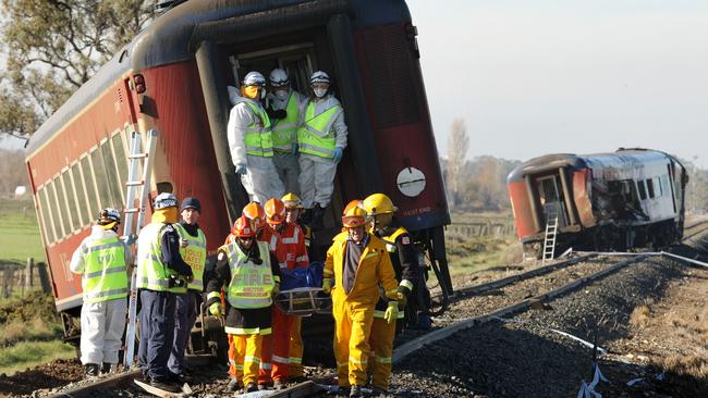 Eleven passengers died and 23 were injured when a B-double truck crashed into the side of a Swan Hill train bound for Melbourne on June 5, 2007. The second carriage of the train was ripped apart by the impact and the third carriage derailed, making it one of the worst train wrecks ever in Victoria. This photo of a body being removed by emergency services workers shows the horror which greeted those at the scene. The truck driver was later found not guilty of culpable driving charges and a coroner’s inquiry led to a series of recommendations to improve the safety of trains, trucks and level crossings.