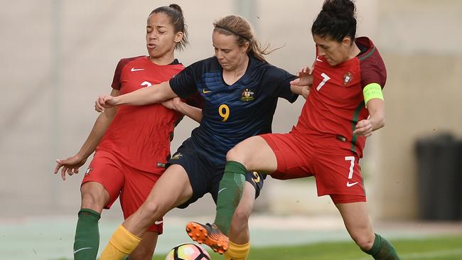 Portugal’s Claudia Neto competes for the ball with Port Pirie’s Emily Condon during the women's Algarve Cup Tournament in Portugal. Picture: Octavio Passos/Getty Images