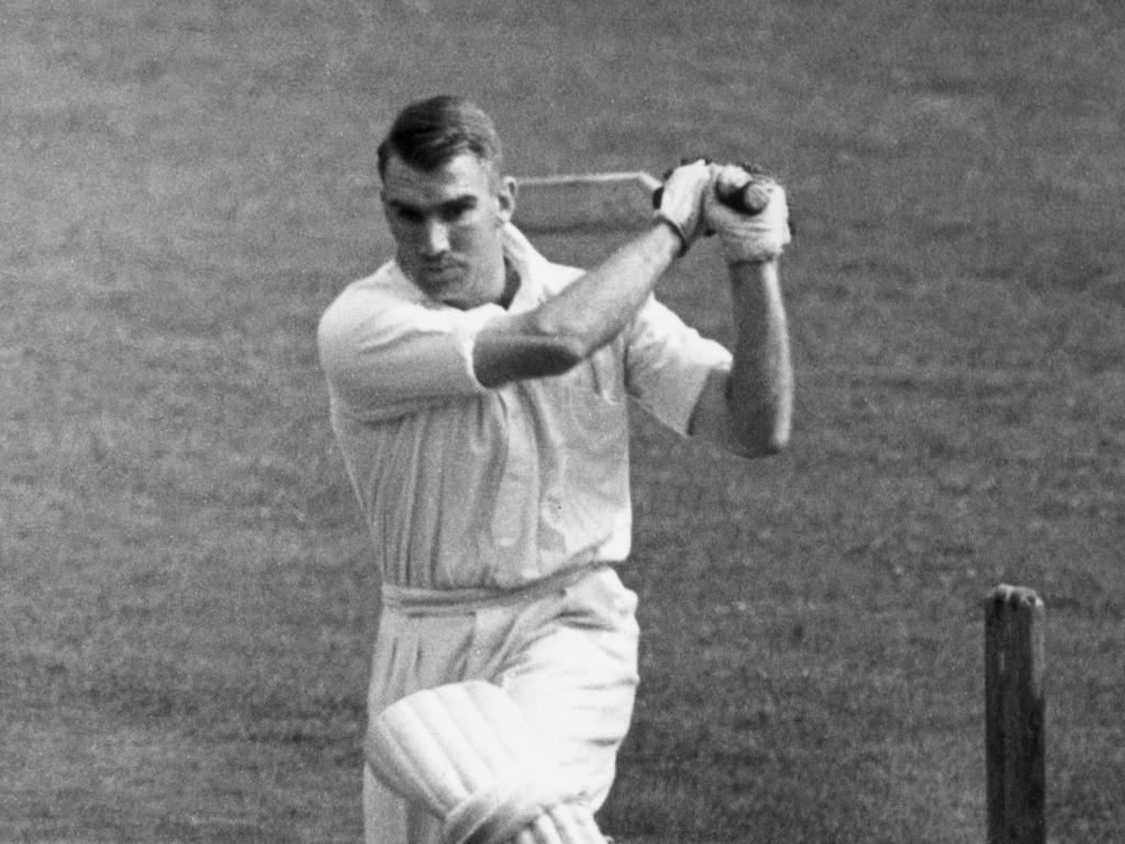 John Reid of New Zealand drives a ball to the boundary.