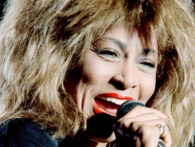 (FILES) This file photo taken on July 9, 1987 shows US singer Tina Turner performing during a concert in Annecy, France. - Music legend Tina Turner is the subject of one of the most successful biopics ever made but she tells the makers of a new documentary there's much more to her story. "Tina" by Oscar-winning directors Dan Lindsay and T.J. Martin premiered on March 2, 2021 at the Berlin film festival. (Photo by Pierre BESSARD / AFP)