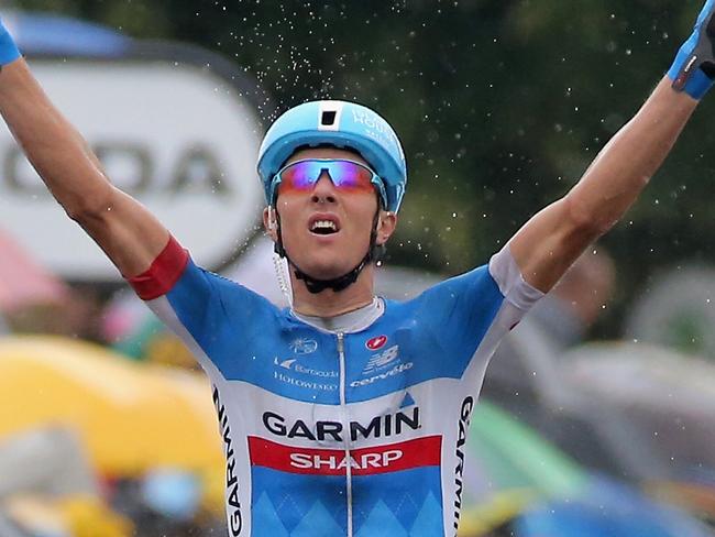 BERGERAC, FRANCE - JULY 25: Ramunas Navardauskas of Lithuania and Garmin-Sharp celebrates as he crosses the finish line to win the nineteenth stage of the 2014 Tour de France, a 208km stage between Maubourguet Pays du Val d'Adour and Bergerac, on July 25, 2014 in Bergerac, France. (Photo by Doug Pensinger/Getty Images)