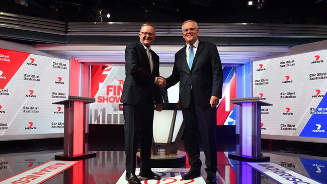 Australian Prime Minister Scott Morrison and Australian Opposition Leader Anthony Albanese shake hands during the third leaders' debate at Seven Network Studios, Wednesday, May 11, 2022. Picture: Mick Tsikas