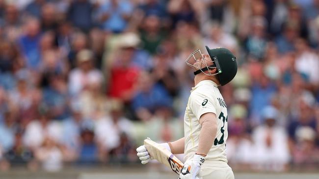 David Warner looks dejected after being dismissed by Stuart Broad. Picture: Getty