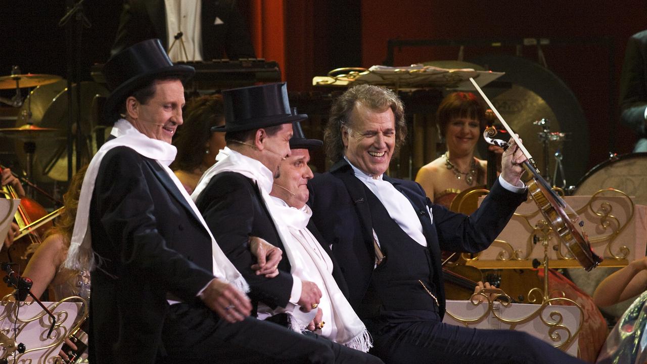 Australian Gary Bennett on left. Andre Rieu during a 2011 concert in Mexico. Picture: supplied