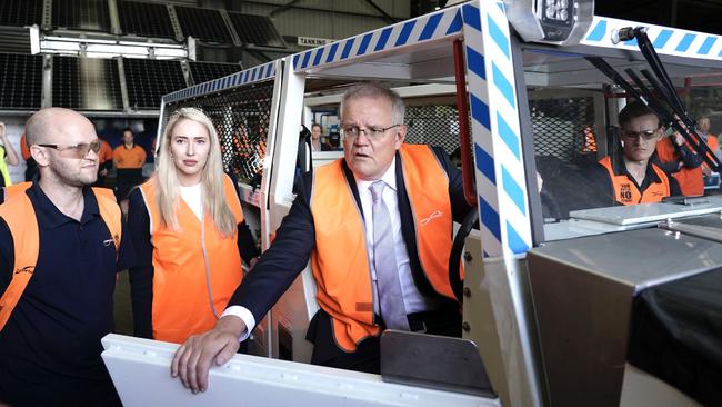 Scott Morrison visits electrical engineering company Ampcontrol in the NSW Hunter Valley with Liberal candidate Brooke Vitnell, centre. Picture: Adam Taylor