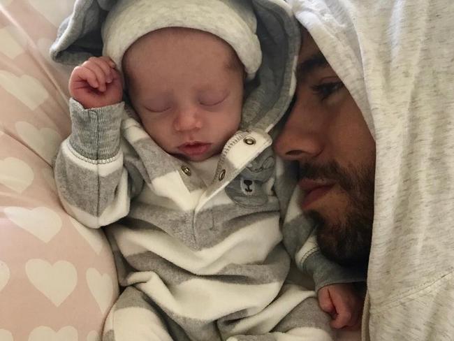 Enrique Iglesias cuddles up to one of his twins. Picture: Instagram