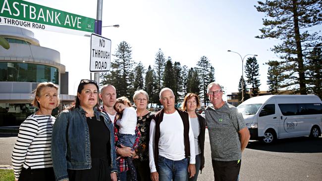 Jenny Moorhead, Kelly L'Estrange, Terence Donoghue, Jessica Donoghue, Susan Gorton, David Muirhead, Christine Lanceley and Curtis Berry at Eastbank Ave, Collaroy. Picture: Adam Yip / Manly Daily