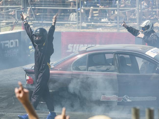 SUNDAY TELEGRAPH SPECIAL. A driver celebrates after preforming a burnout during Summernats 31 2018. Photo: Keegan Carroll