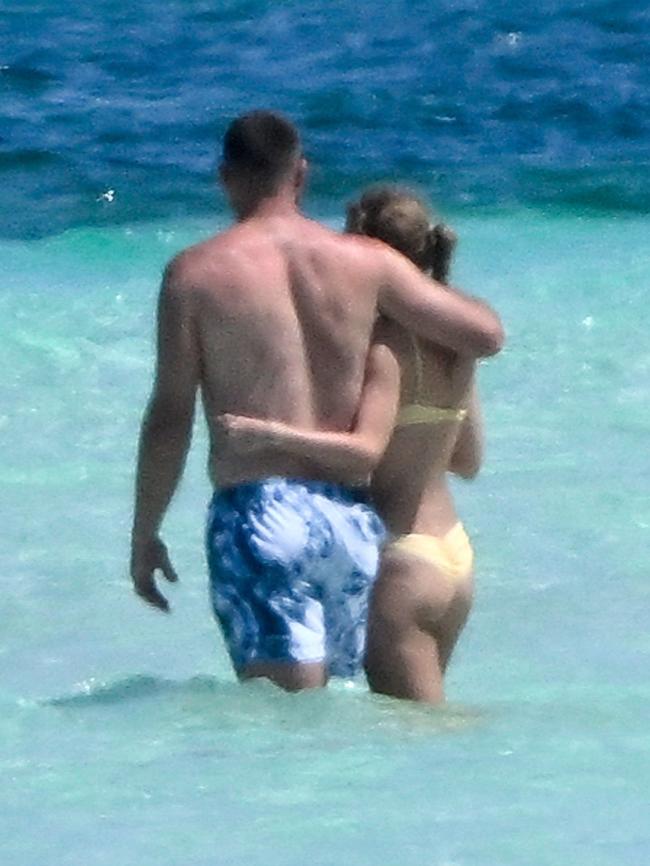 The loved-up pair couldn’t keep their hands off each other as they frolicked in the sunshine. Picture: Backgrid