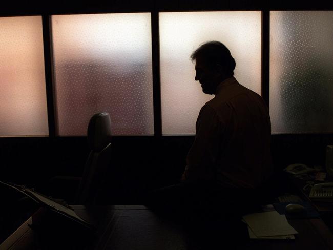 Generic image. Silhouette of a man (parent of) a sex abuse victim in an office. wrongly accused of touching young girl. Child sexual abuse. sex crime incest paedophilia.