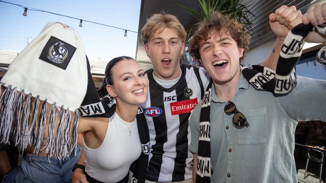 ADELAIDE, AUSTRALIA - Advertiser Photos SEPTEMBER 30, 2023: Imogen Schubert 21, Caleb Rhodes 22, and Haydn Dzenis 21 watching the AFL Grand Final Collingwood v Brisbane at The Highway on Anzac Parade  SA. Picture: Emma Brasier