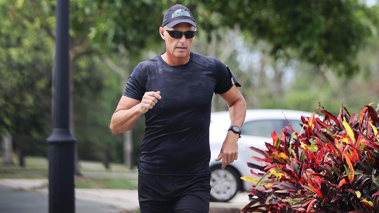 Stood-down cop Senior Sergeant Arron Ottaway out jogging on the Gold Coast. Picture: Nigel Hallett