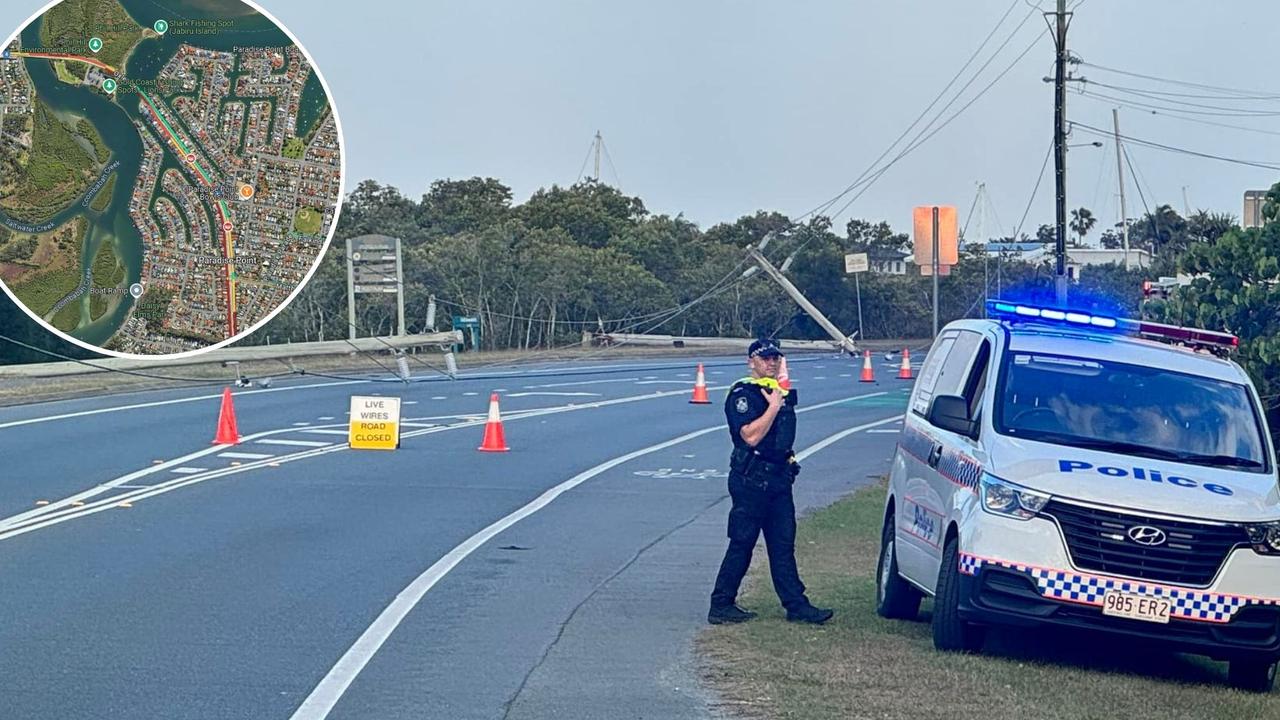 Road closed, power out after mystery power poles collapse