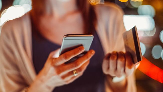 Young woman phoning the bank for credit card support   istock image