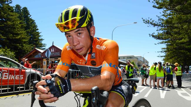 Mitchelton-Scott rider and race leader Caleb Ewan of Australia is exhausted from the heat after finishing the stage on the third day of the Tour Down Under cycling race in Adelaide on January 18, 2018.  / AFP PHOTO / BRENTON EDWARDS / --IMAGE RESTRICTED TO EDITORIAL USE - STRICTLY NO COMMERCIAL USE--