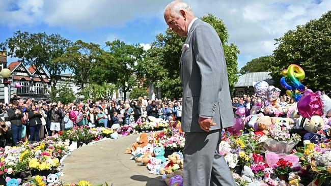 King Charles visits the site of the Southport stabbing at a Taylor Swift dance class for children. Picture: AFP