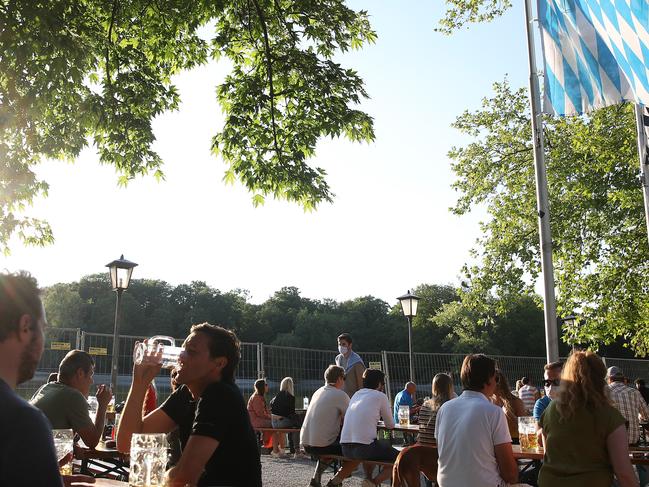 German beer drinkers celebrate the end of lockdown. Pictures: Getty