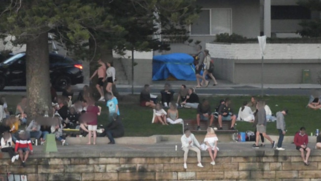 People drinking at East Esplanade on August 29, 2020, during COVID-19 when alcohol has been banned in the area. Picture: Supplied.