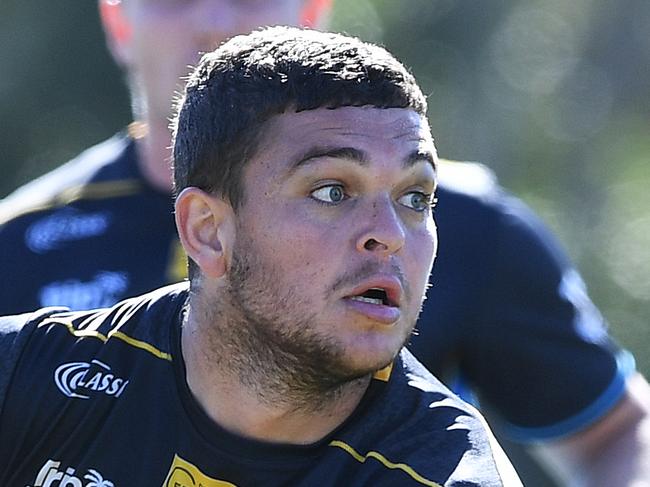 Ash Taylor looks on during a Gold Coast Titans training session on the Gold Coast, Monday, June 11, 2018. (AAP Image/Dave Hunt) NO ARCHIVING