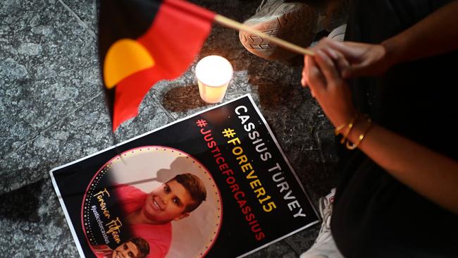 Mourners hold a candlelight vigil for murdered teenager Cassius Turvey, 15, in Brisbane.