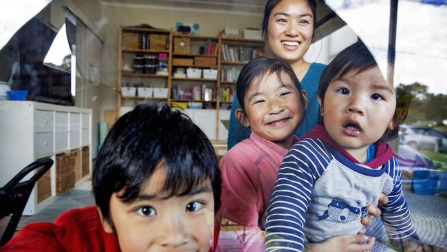 Mum Hong with her children Callum, 7, Eloise, 5, and Theo, 1 1/2. Picture: Christian Gilles