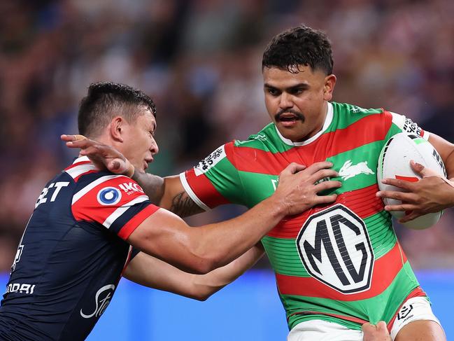 SLatrell Mitchell of the Rabbitohs is tackled. (Photo by Cameron Spencer/Getty Images)