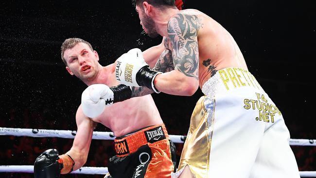 Michael Zerafa lands a one of 14 consecutive punches to Jeff Horn’s head in the ninth and final round of their fight in Bendogo on Saturday. Picture: Quinn Rooney/Getty Images