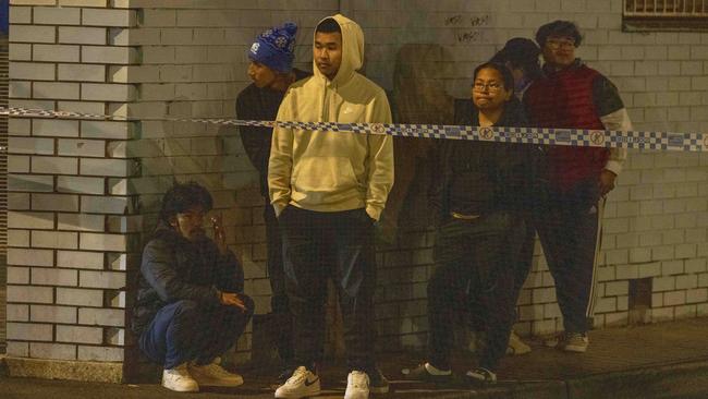 People gather at the scene following the fatal stabbing. Picture: Wayne Taylor