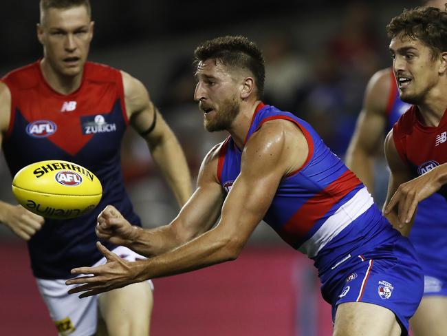 Marcus Bontempelli handpasses the ball during a standout performance. Picture: Getty Images