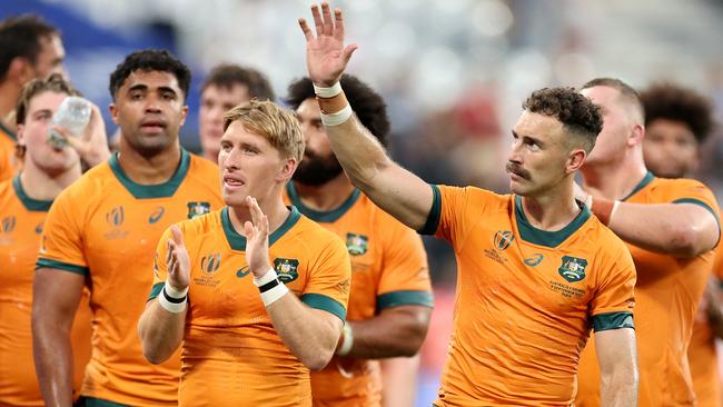 Wallabies players celebrate the win after the final whistle. Picture: Getty Images