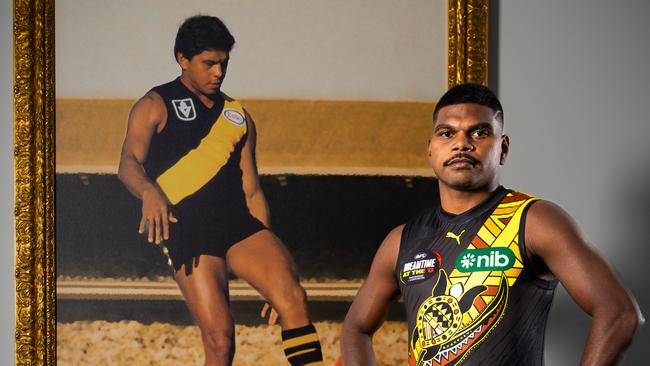 Richmond forward Maurice Rioli Jr in the Dreamtime guernsey he designed for Sir Doug Nicholls Round 2024. He is pictured in the club's Maurice Rioli Centre, named in his father's honour. Picture: Richmond FC