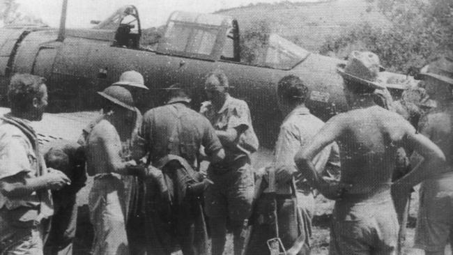 RAAF Squadron Leader John Jackson receiving medical attention for his finger on his return to Port Moresby in 1942. Picture: Australian War Memorial.