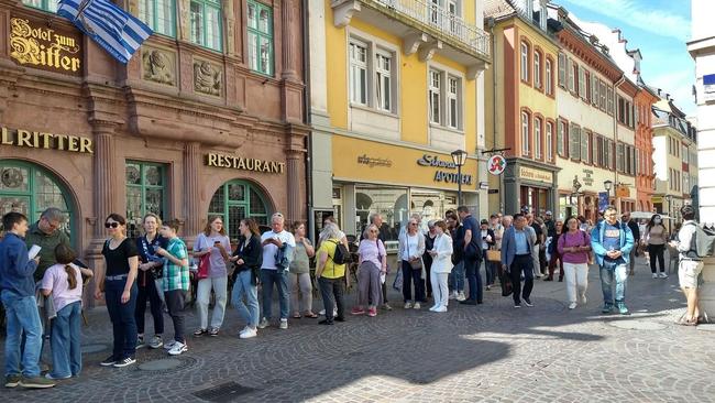 Swifties queue to get into the church in Heidelberg, Germany.