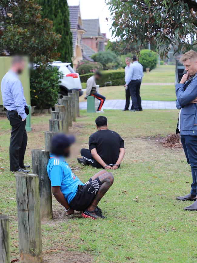 The three men were handcuffed after being stopped in a car. Picture: NSW Police