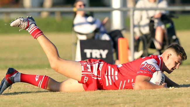 Lachlan Smith scoring a try. Picture by Richard Gosling