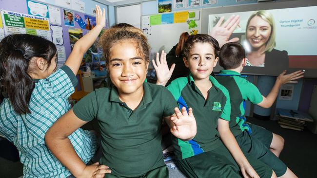 Moreton Downs State School Year 4 Students Mary-Jane Smith and Aidan Baker taking part in a Kids Helpline video counselling session. Picture: Lachie Millard