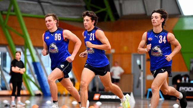 Harry Evans, Patrick Retschko and Kynan Brown of the Oakleigh Chargers. (Photo by Josh Chadwick/AFL Photos via Getty Images)